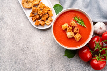 Homemade tomato soup on vintage table