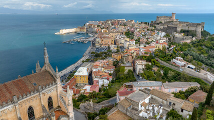 Obraz premium Skyline of the historic center of the town of Gaeta, overlooking the Mediterranean Sea. It's a tourist destination in province of Latina, Lazio, Italy. In foreground there is the temple of St. Francis