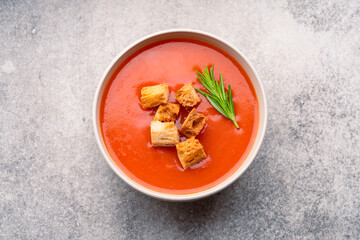 Homemade tomato soup on vintage table