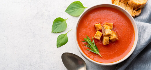 Homemade tomato soup on vintage table