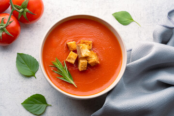 Homemade tomato soup on vintage table