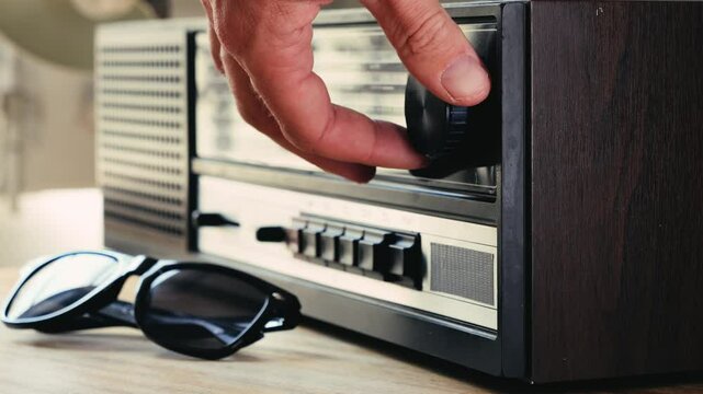 Old Retro AM FM Radio with tubes, Hand Changing stations , bulb vintage music player.