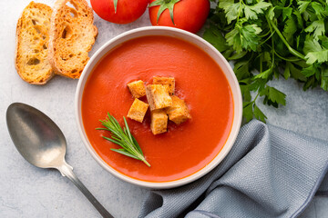 Homemade tomato soup on vintage table