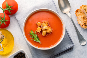 Homemade tomato soup on vintage table