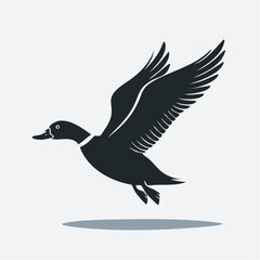 Obraz premium Flying Duck Silhouette — Flat 2D Minimalist Vector