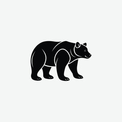 Fototapeta premium Minimalist Bear Silhouette on White Background – High-Quality Black Animal Art
