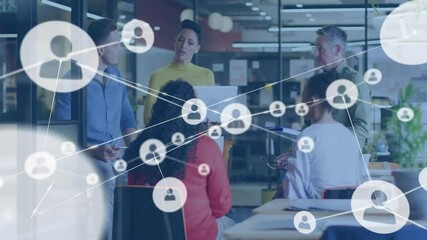 Business team reviewing documents while discussion initiating network visualizing connectivity - Powered by Adobe