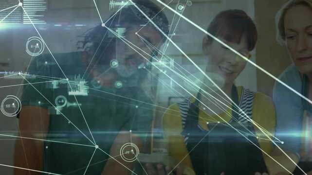 Baristas reviewing devices and activating holographic overlay while analyzing coffee shop metrics - Powered by Adobe