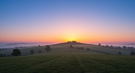 Fototapeta premium Sunrise over rolling hills