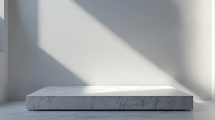 A white pedestal with a shadow on it