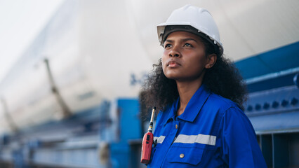 Engineer conducting outdoor railway inspection for natural gas transport and industrial freight...