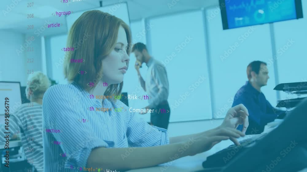 Poster analyst typing code triggers security overlay showing threats while team monitoring and calling