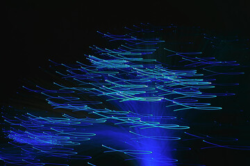Abstract long exposure photography of blue light trails