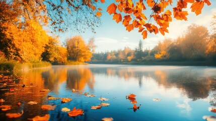 A serene autumn landscape with a lake reflecting colorful trees and leaves floating on the water surface