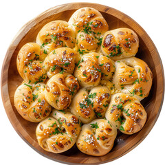 Freshly baked, golden-brown garlic rolls garnished with herbs in a wooden bowl
