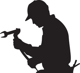 Silhouette of a Male Worker Using a Wrench
