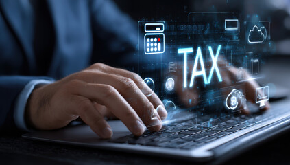 Digital tax concept with hands typing laptop, featuring holographic tax symbols and icons, conveying modern finance