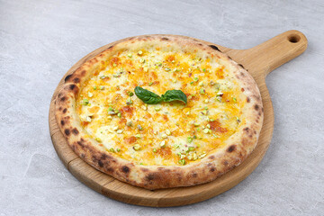 Neapolitan Four Cheese Pizza with Honey Pistachios on Wooden Board