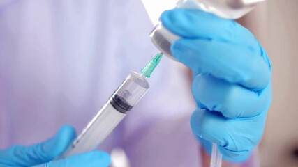 A doctor or nurse wearing latex gloves CU Shot of person hands preparing - Powered by Adobe