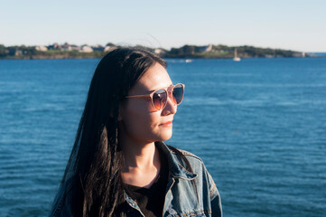 an attractive woman with narragansett bay background in Rhode island