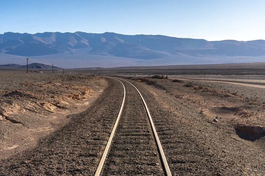 Railroad tracks stretching through La Puna, Argentina