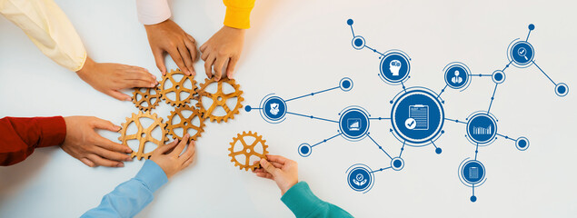 Engaging image showcasing hands working together with gears, symbolizing collaboration and innovation in business processes with digital icons representing various concepts. Amity