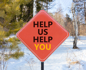 Help you symbol. Concept words phrase Help us help you on beautiful red road sign. Beautiful winter...