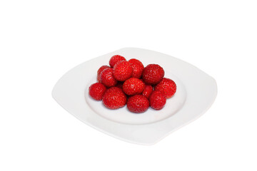 Strawberries served with milk on white plate isolated 

