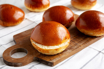 Homemade Brioche Buns Ready to Eat, side view.