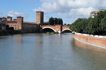 Picturesque view of Castelvecchio and the Scaliger Bridge over the Adige River in Verona.