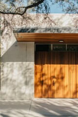 Elegant wooden door with modern architecture in bright daylight, showcasing shadows created by overhanging branches, perfect for a contemporary home entrance