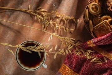 Breakfast on the table. Food and napkin on a dark background. Abstract backdrop