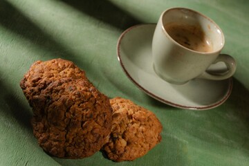 Cup of coffee for morning breakfast. Still life food - dark photo style. Culinary background - appetizing mood