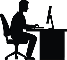 silhouette of a man working at a desk with a computer 