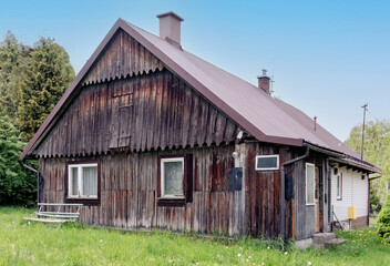 old rural wooden house, summer landscape