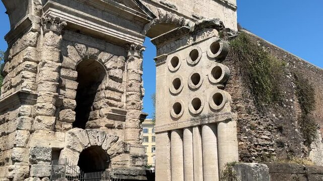 Ancient gate in Rome&rsquo;s Aurelian Walls. Historic stone archway serving as an entrance to the city&rsquo;s defensive walls, showcasing Roman military architecture.

