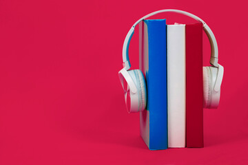 Learning French, headphones and textbooks. Listening to books of French literature, audiobook....