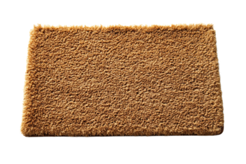 A close up shot of a rectangular brown coir doormat with a rough texture on a black background