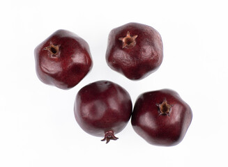 artificial plastic fruit pomegranate isolated on white background