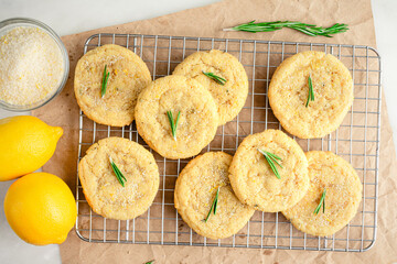 Rosemary-Lemon Sugar Cookies Cooling on a Wire Rack: Directly above half a dozen freshly baked homemade sugar cookies on a wire cooling rack