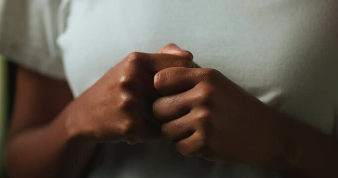 Stress, worry and hands of woman with fear, nervous and confused closeup. Scared, anxiety and isolated female person overwhelmed with phobia, emotions and crisis reaction for terror or mistake