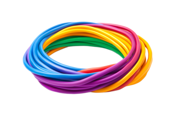 A colorful coil of wires arranged in a circular shape against a black isolated background view from above