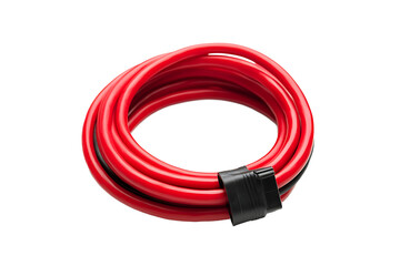 Fototapeta premium A coiled red cable with a black plastic clip on a black background in a studio setting close up view