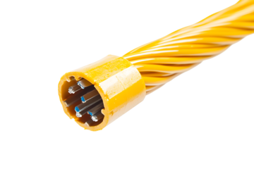 Close up of a yellow electrical cable with exposed wires against a black background space for text