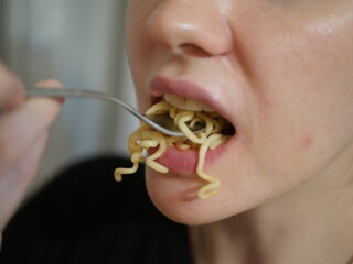 Closse up of girl mouth eating food