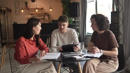 young man entrepreneur on the meeting with females financial advisers - Powered by Adobe
