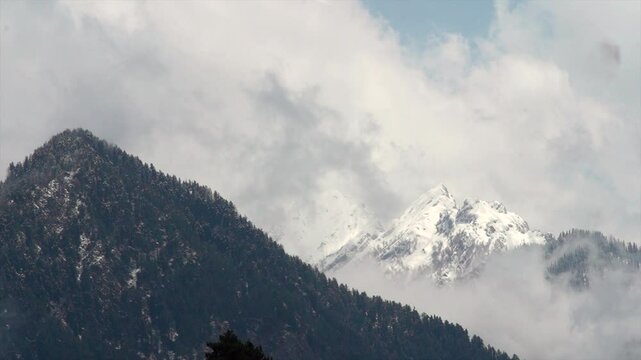 Pahalgam, Kashmir, India - 09 May 2023: Beautiful view of Pahalgam during summer season fresh frozen Himalayas glacier mountains, view of Betab Valley and green fir and pine tree line forest Clip