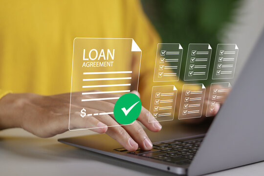 Loan agreement borrow money from bank, mortgage, debt, obligation to pay back interest rate, personal loan, financial support. Person using laptop with approved loan agreement on virtual screen.