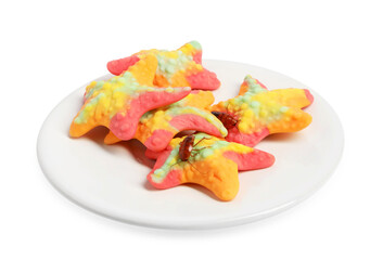 Cockroaches crawling on gummy candies against white background