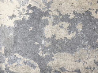 Cracked concrete vintage wall background texture.